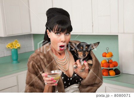 Woman Holding Chihuahua Dog 8080071