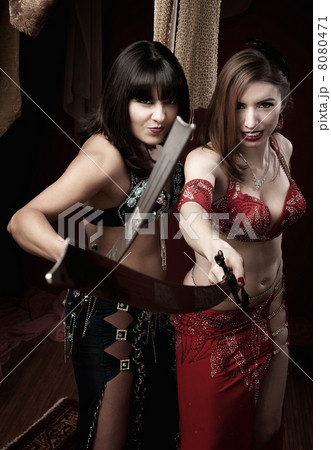 Belly Dancers Holding Swords 8080471