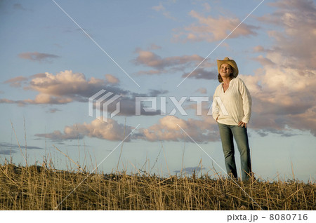 Western Woman Against a Cloudy Sky 8080716