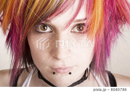 Punk Girl with Brightly Colored Hair Punk Girl with Brightly Colored Hair 8080786