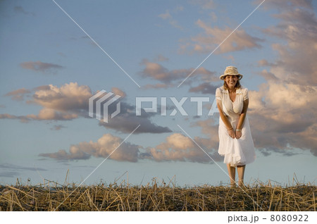 Woman Against a Cloudy Sky 8080922