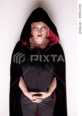 Female Vampire in a Dark Hood 8081340
