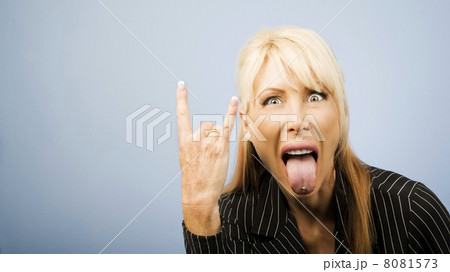 Businesswoman making bull horns Businesswoman making bull horns 8081573