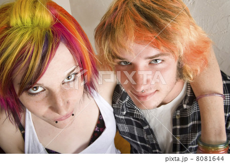 Young Couple with Bright Colored Hair Embrace Young Couple with Bright Colored Hair Embrace 8081644