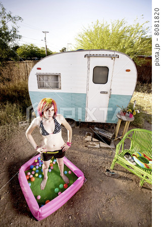 Woman outside a trailer Woman outside a trailer 8081820