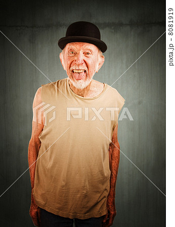 Crazy man in bowler hat 8081919