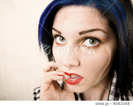 Wide Angle Portrait of a Apprehensive Rockabilly Girl 8082088