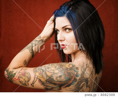 Woman with tattoos 8082300