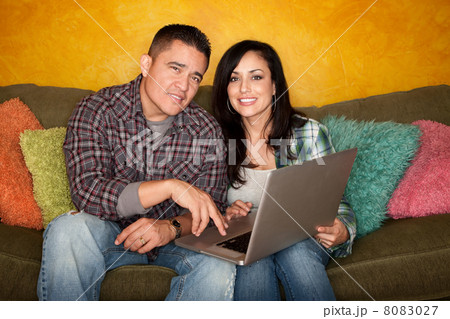 Hispanic Couple with Computer Hispanic Couple with Computer 8083027