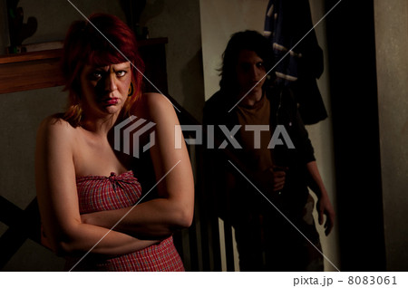 Frightened young woman 8083061