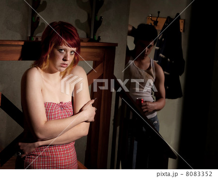 Frightened young woman 8083352