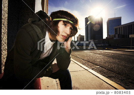 Handsome young man at sundown in city Handsome young man at sundown in city 8083403