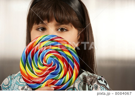 Cute young girl with lollipop Cute young girl with lollipop 8084067