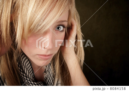 Close up of pretty blonde woman 8084158