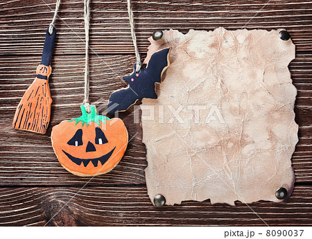 Old paper for congratulations with Halloween and homemade cookie Old paper for congratulations with Halloween and homemade cookie 8090037