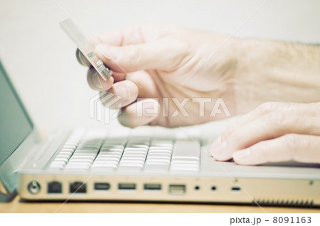 Man Using Credit Card Online  8091163