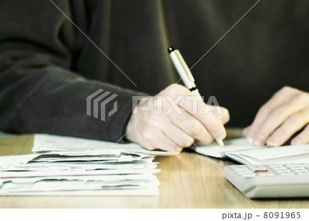 Man Writing a Check Man Writing a Check 8091965