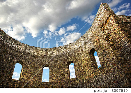 Ruin wall with windows of an old church 8097619