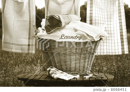 Laundry basket on rustic table 8098451