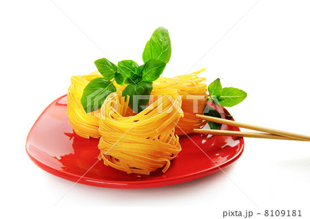 Pasta nests on a dish Pasta nests on a dish 8109181