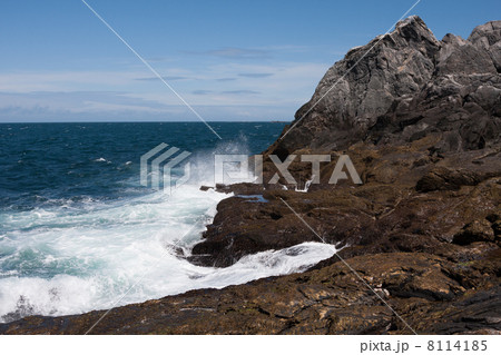 Splashing waves at Runde Island near the lighthouse (Norway) 8114185