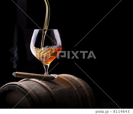 Cognac and Cigar on black with vintage barrel 8114643
