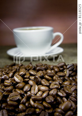 cup of coffee and beans on sack 8118325