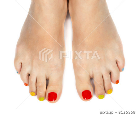 Female feet with a pedicure color Female feet with a pedicure color 8125559