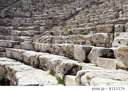 closeup of steps of ancient Greek amphitheatre 8131574