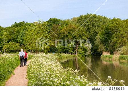 Elderly couple walking in nature Elderly couple walking in nature 8138011