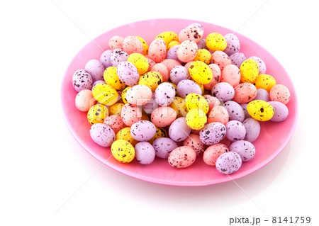 Pink plate filled with easter eggs Pink plate filled with easter eggs 8141759