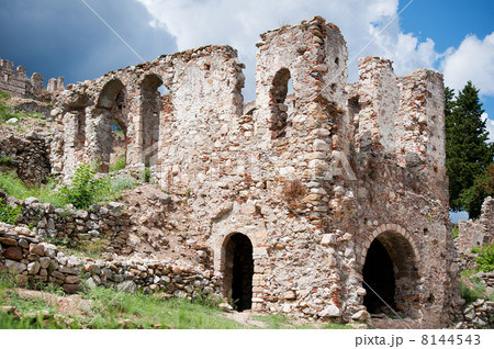 Old ruin iwth dark clouds 8144543