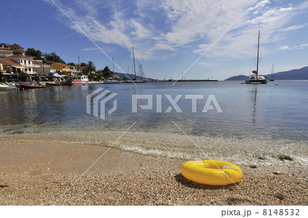 Yellow floating toy at Greek coast Yellow floating toy at Greek coast 8148532