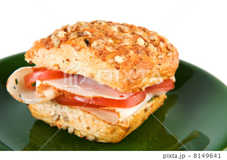Bread roll with chicken and tomatoes 8149641