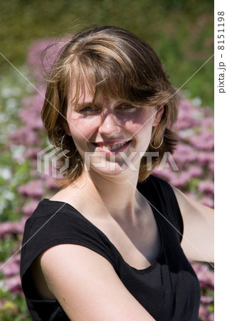 Young woman in a garden 8151198