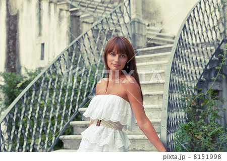 Beautiful woman near old palace 8151998