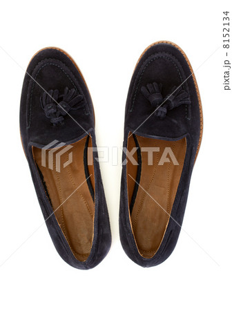 Pair of blue female shoes over white, view from above 8152134