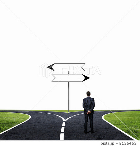 Businessman at crossroads 8156465