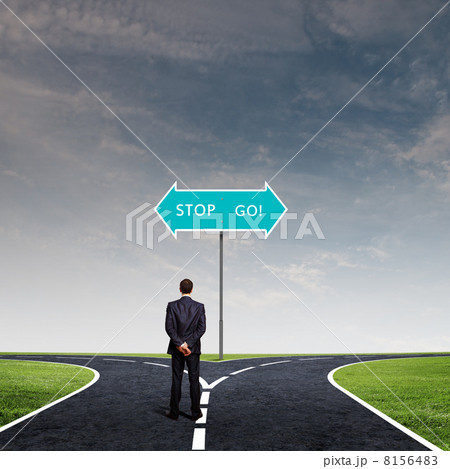 Businessman at crossroads 8156483