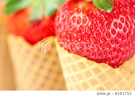 strawberry in a waffle cone closeup 8161752