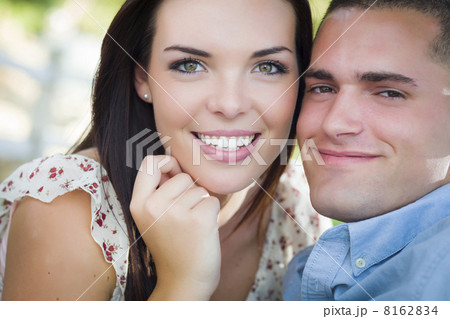 Mixed Race Romantic Couple Portrait in the Park 8162834