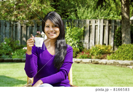 Portrait of woman with a cup of tea 8166583