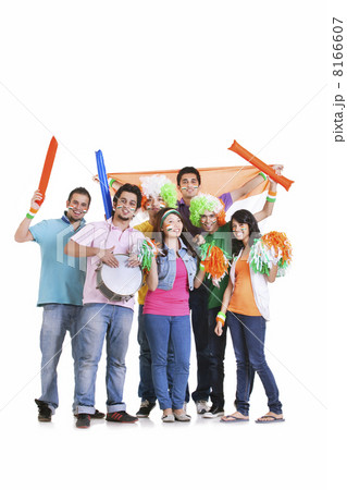 Portrait of young friends in casuals cheering with Indian flag over white background 8166607