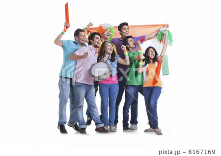Full length of excited young friends looking away while cheering with Indian flag over white background 8167169