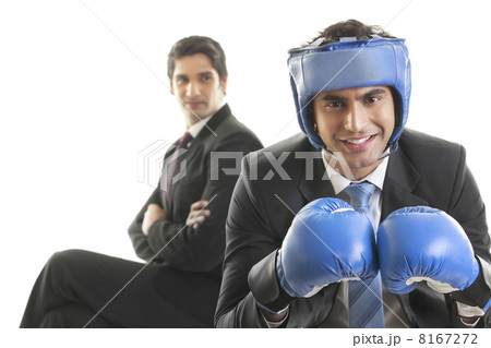 Portrait of businessman with boxing gloves Portrait of businessman with boxing gloves 8167272
