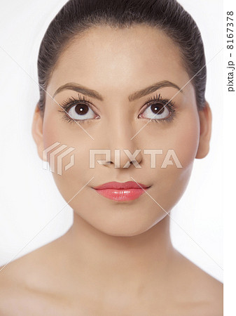 Close-up of young woman looking up Close-up of young woman looking up 8167378