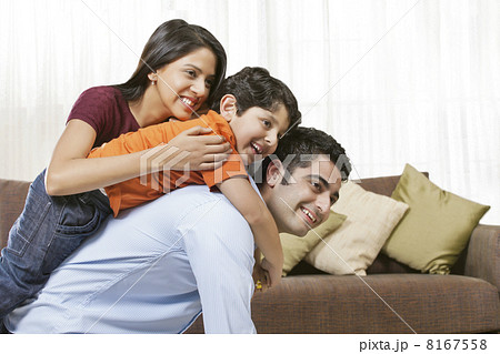 Happy Indian family of three at home 8167558