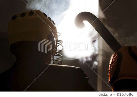 Hockey player with hockey stick 8167696