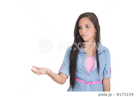 beautiful woman showing something on the palm of her hand 8175239