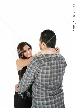 Happy loving couple hugging - isolated over a white background Happy loving couple hugging - isolated over a white background 8175244